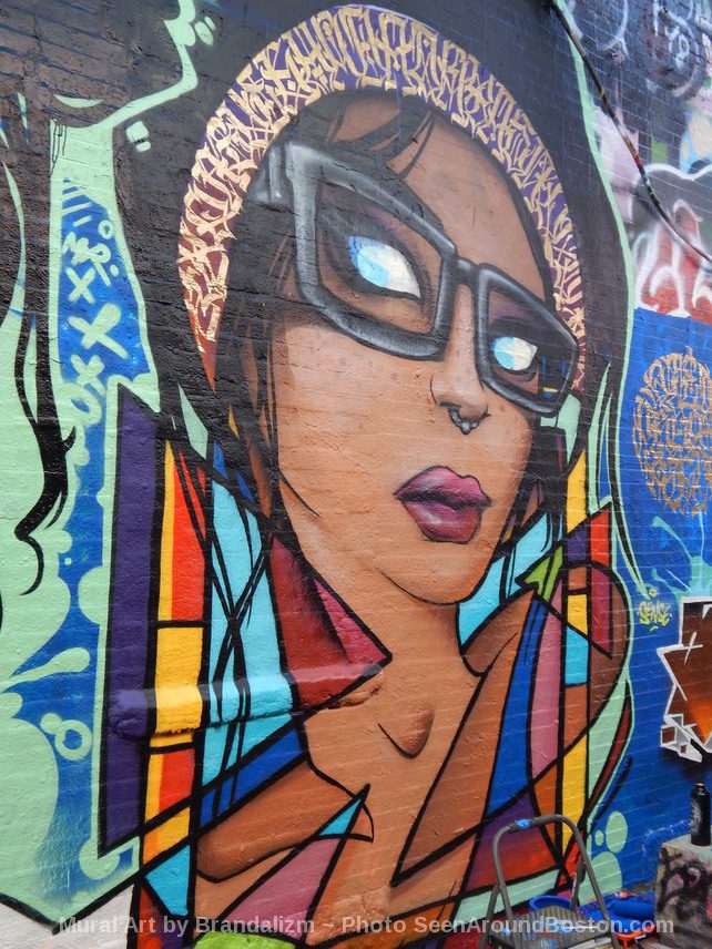 artist brandalizm mural in graffiti alley, cambridge